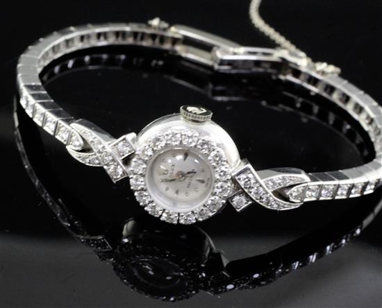 A ladys 18ct white gold and diamond set Rolex Precision manual wind cocktail watch,